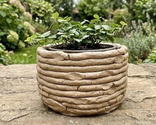 4. Coiled Rope Boho Clay Planter