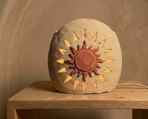 5. Layered Sunburst Clay Lamp