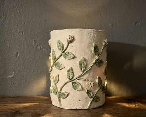 8. Clay Lantern With Raised Vines